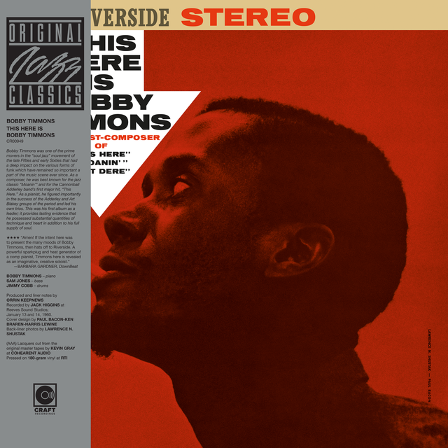 Album cover with a stylized portrait of Bobby Timmons and text for the record title 'This Here Is' on a red background