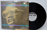 Vinyl record with cover featuring a person wearing sunglasses, labeled 'The Best of Bobby Womack 1967-1975'.