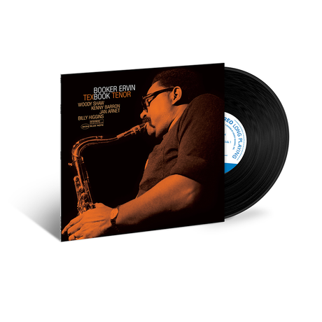 Vinyl record with a cover featuring a saxophonist on a white background