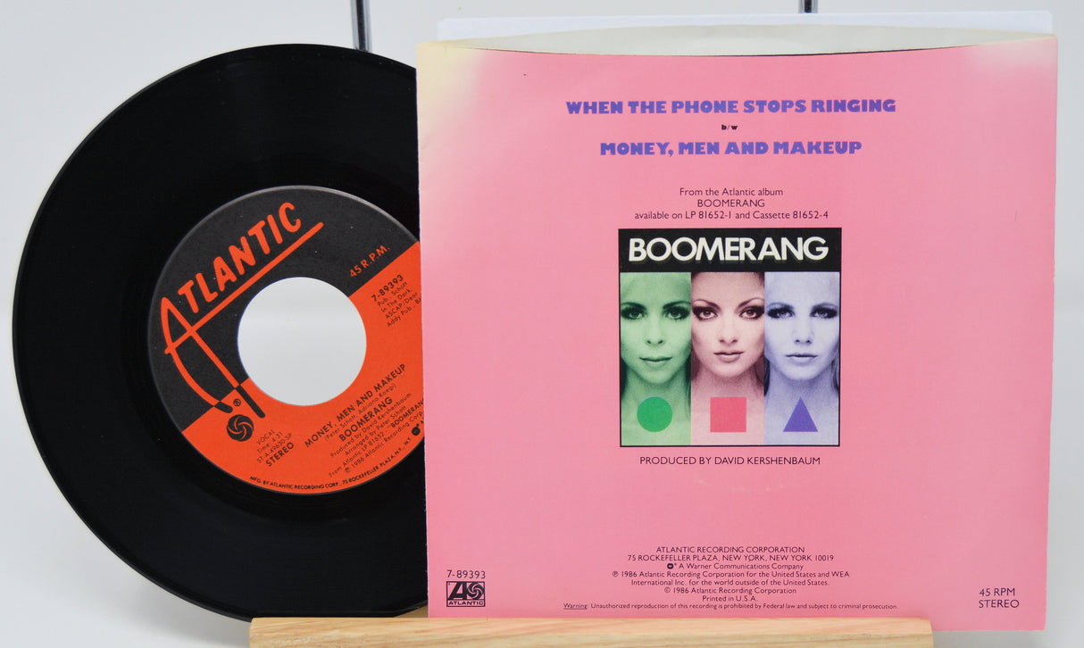 Vinyl record with Atlantic label and record cover for 'Boomerang' album on a white background