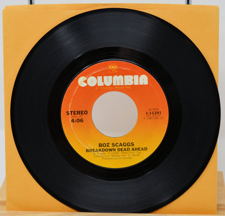 Boz Scaggs 'Breakdown Dead Ahead' 45 RPM Columbia vinyl record with orange and yellow label