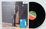 Boz Scaggs 'This LP Is an American Progression' vinyl record shown with the album cover and the black record partially pulled out, on a light gray background.