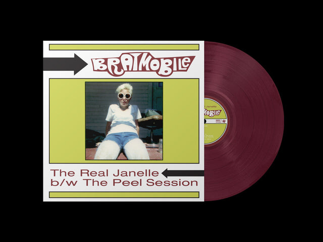 Bratmobile The Real Janelle vinyl record with cover artwork featuring a woman in sunglasses