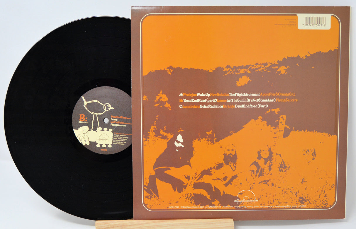 Back cover and vinyl record of Brimstone Solar Radiation Band LP with vintage orange graphics
