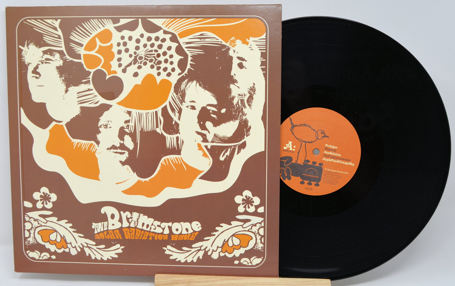 Front cover and vinyl record of Brimstone Solar Radiation Band LP featuring psychedelic band art