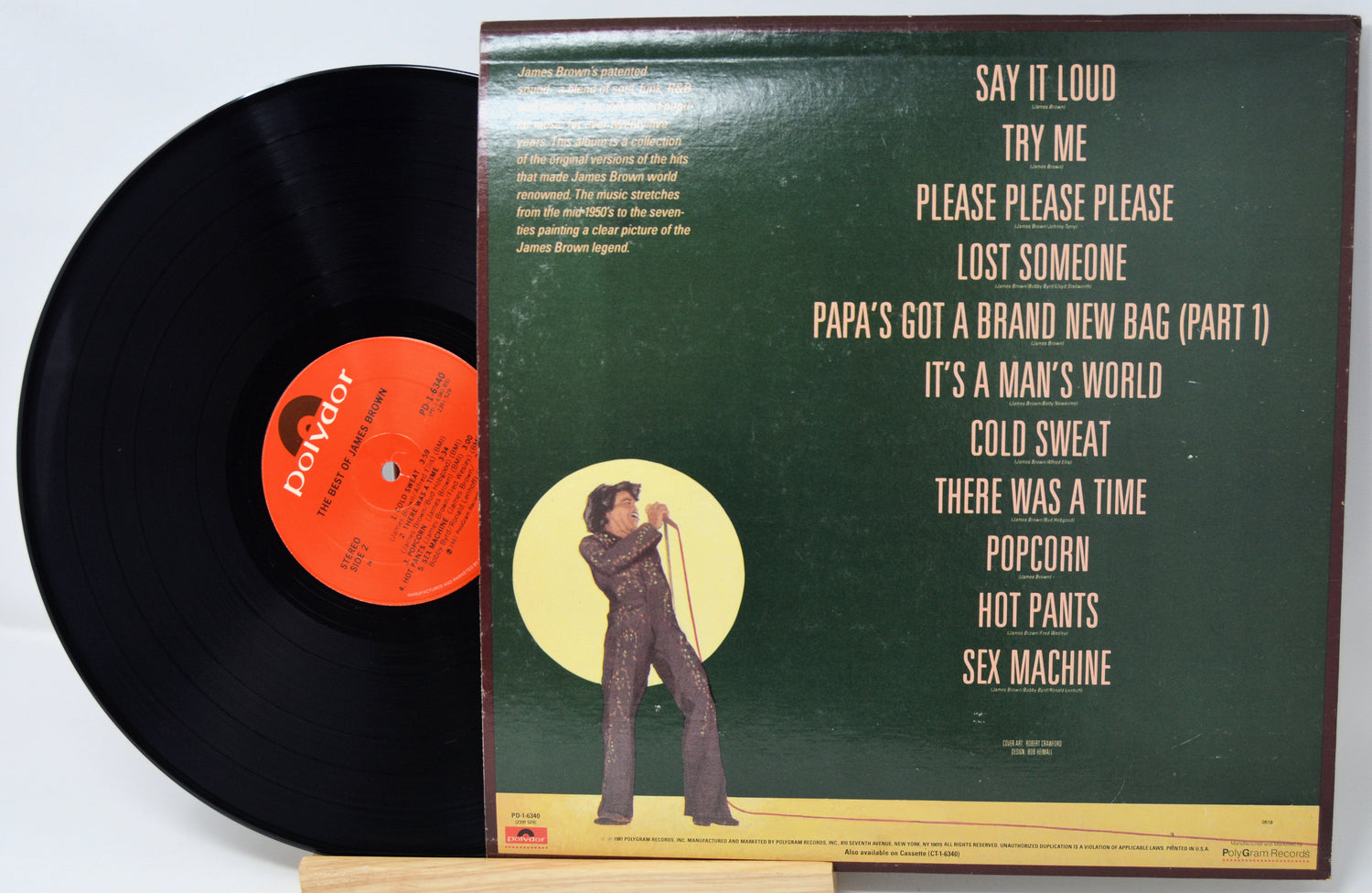 Vinyl record with cover featuring text and a person illustration on a white background