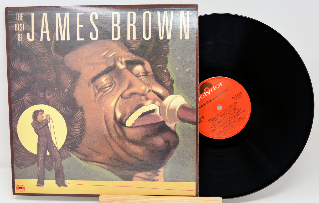 Vinyl record and cover featuring James Brown on a white background
