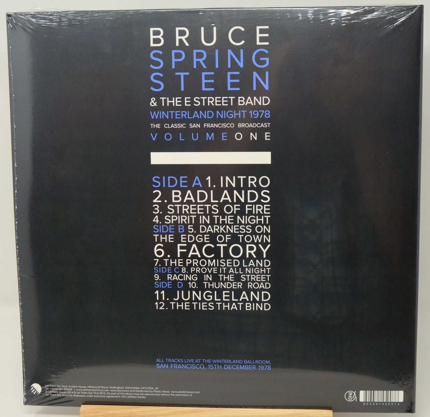 The back cover of Bruce Springsteen & The E Street Band's 'Winter Sand Night 1978' Volume 1 album, sealed in plastic shrink wrap, with a tracklist on a black background.