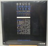 The back cover of Bruce Springsteen & The E Street Band's 'Winter Sand Night 1978' Volume 1 album, sealed in plastic shrink wrap, with a tracklist on a black background.