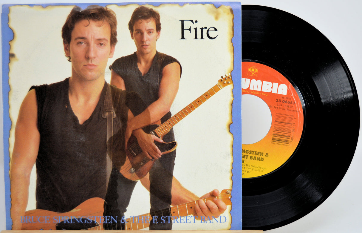 Front cover of Bruce Springsteen & The E Street Band 'Fire' 45 RPM vinyl single with original orange Columbia label