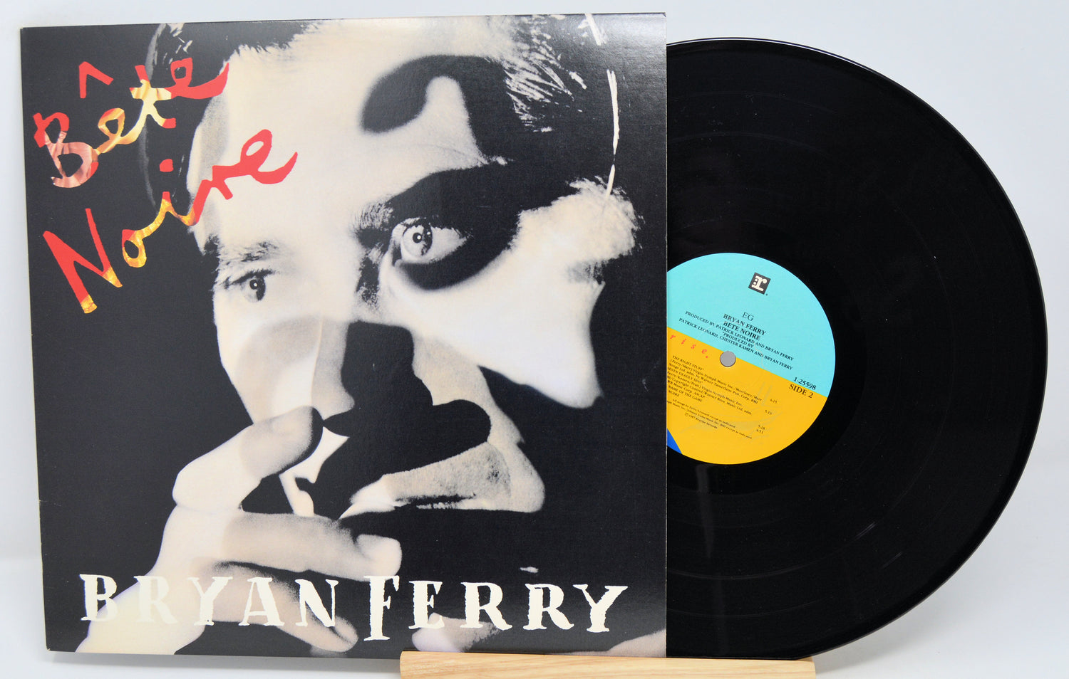 Vinyl record with cover featuring a stylized portrait and album title 'Bête Noire' by Bryan Ferry.