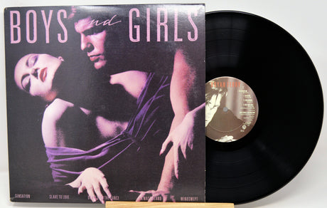 Vinyl record with cover featuring a couple and album title 'Boys and Girls'.
