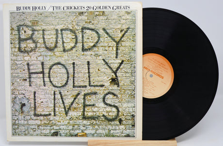 Used vinyl record of Buddy Holly album 'Buddy Holly Lives' with a black and white cover featuring the title and artist name.