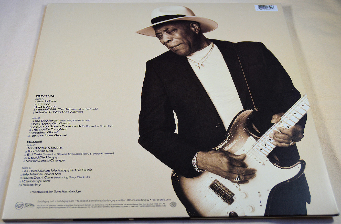 Back cover of Buddy Guy Rhythm & Blues album featuring Buddy Guy with a guitar
