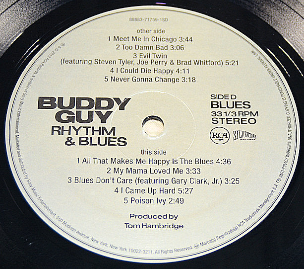 Closeup of Buddy Guy Rhythm & Blues vinyl record label with tracklist and album details