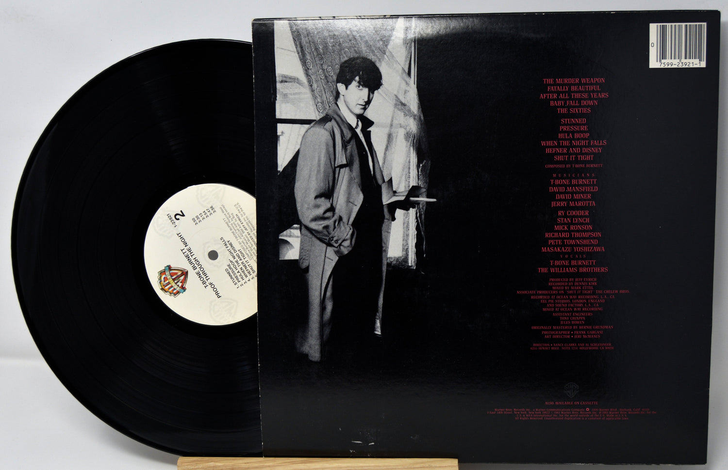 Vinyl record with a black and white photo of a person on the cover