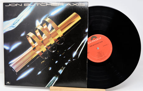 A vinyl record titled 'Jon Butcher Axis' with the band's name and logo on the cover, displaying a black background with metallic elements and text.
