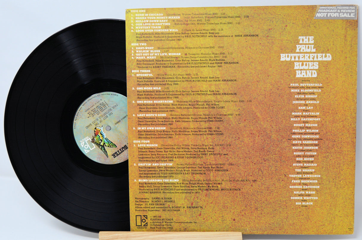 Vinyl record with a yellowed cover featuring text and a logo.