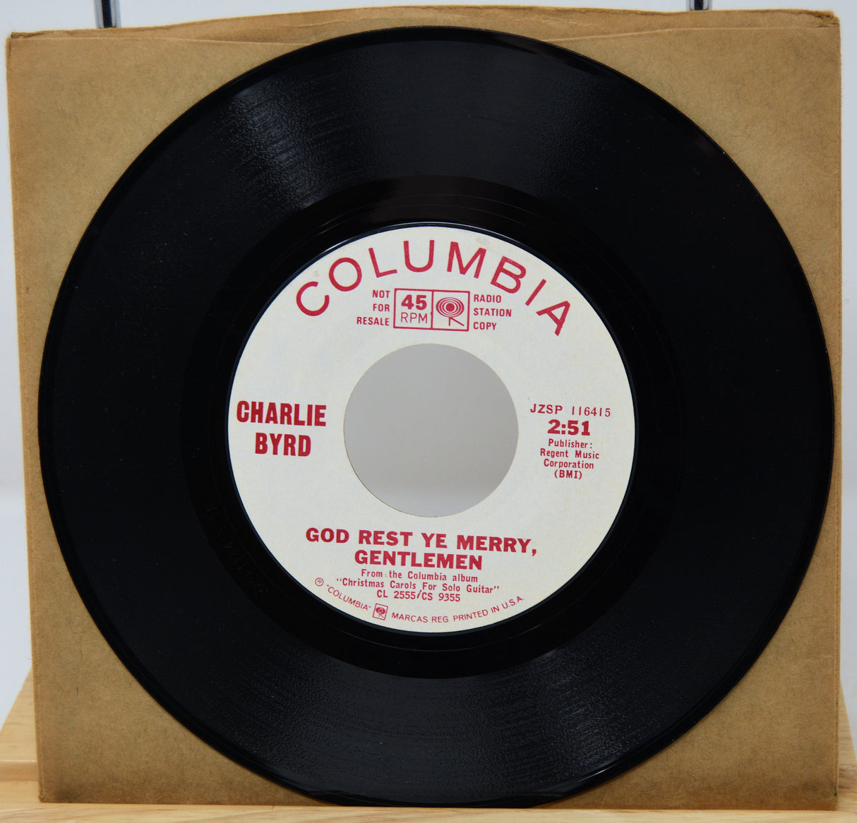 7-inch vinyl record with Columbia label and Charlie Byrd on a cardboard sleeve.