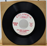 7-inch vinyl record with Columbia label and Charlie Byrd on a cardboard sleeve.