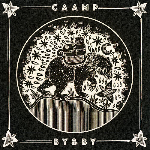 Black and white illustration of a bear with floral elements and decorative border on a black background, featuring the text 'CAAMP' and 'BY&BY'.