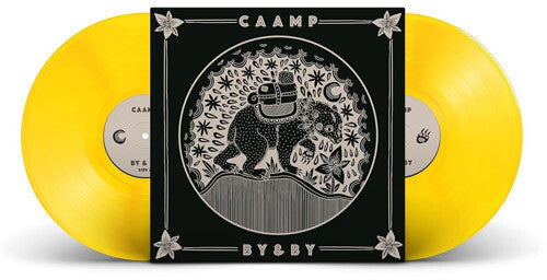 Yellow vinyl records with a black and white label featuring 'CAAMP' and 'BY&BY'.