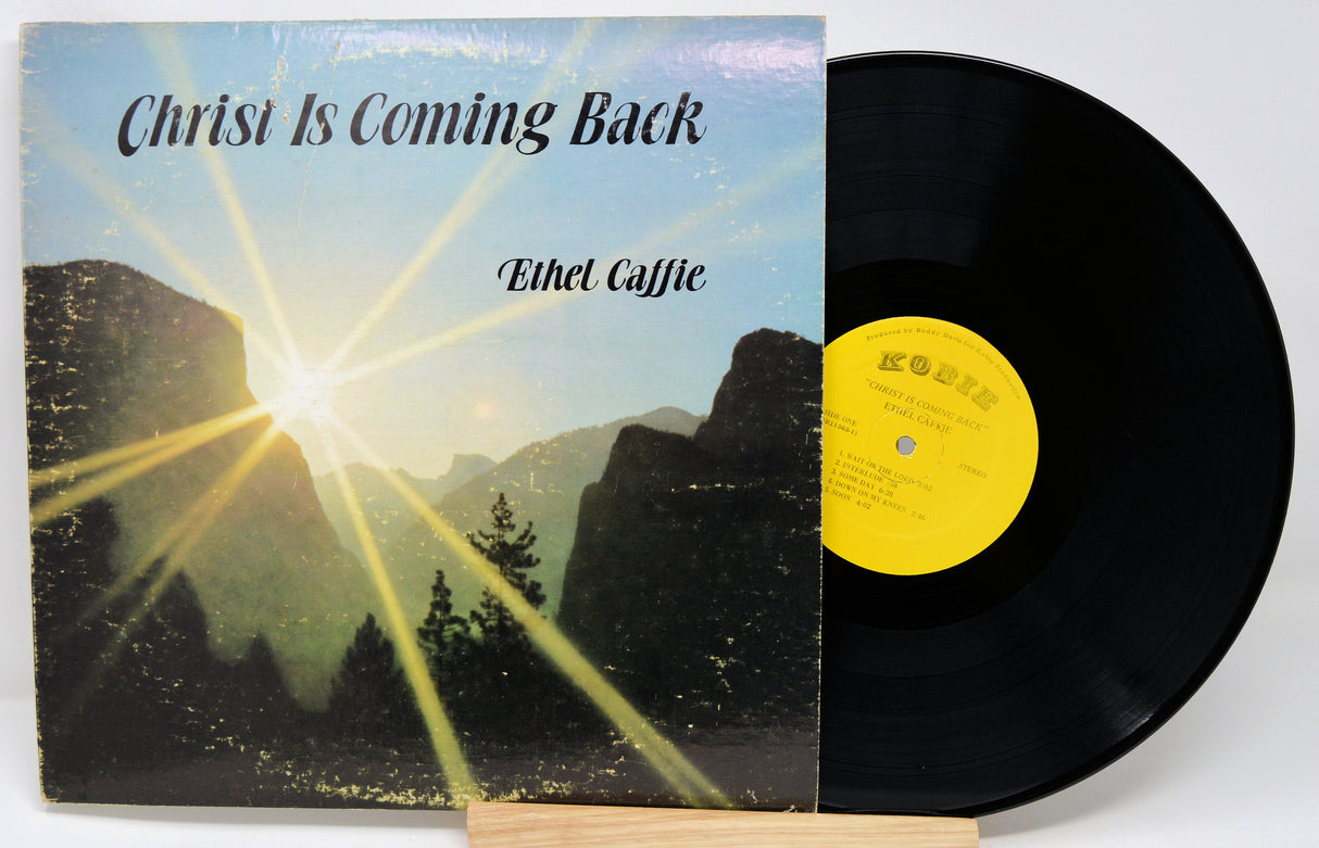 Vinyl record with a mountain and sun design on the cover, featuring the title 'Christ Is Coming Back' by Bihet Gaffie.