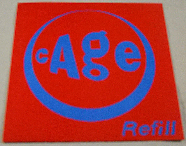Cage Refill record sleeve with iconic blue text on a red background