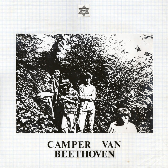 Album cover with black and white photo of people in a rocky area, featuring 'Camper Van Beethoven' text.