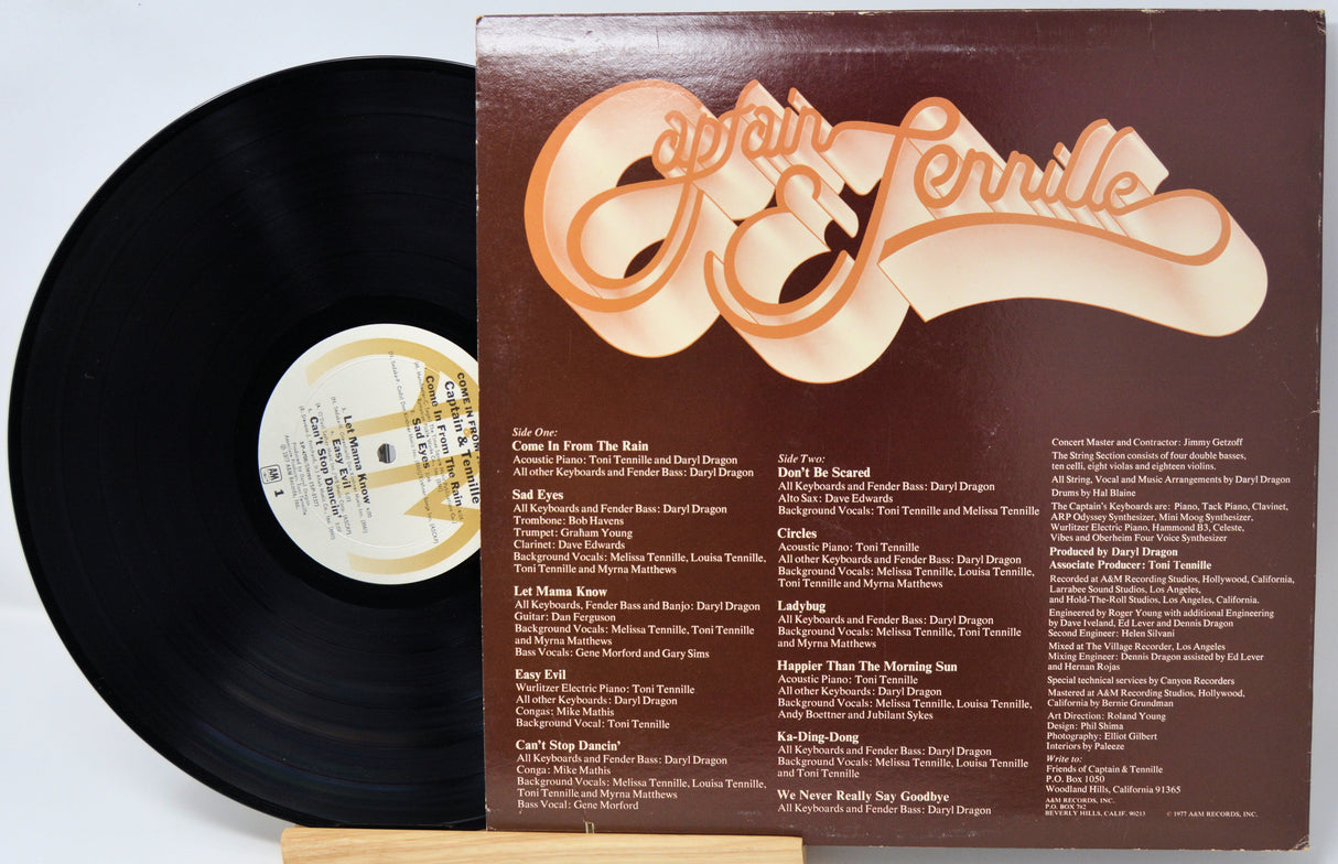 Vinyl record with cover featuring 'Captain & Tennille' on a light gray background