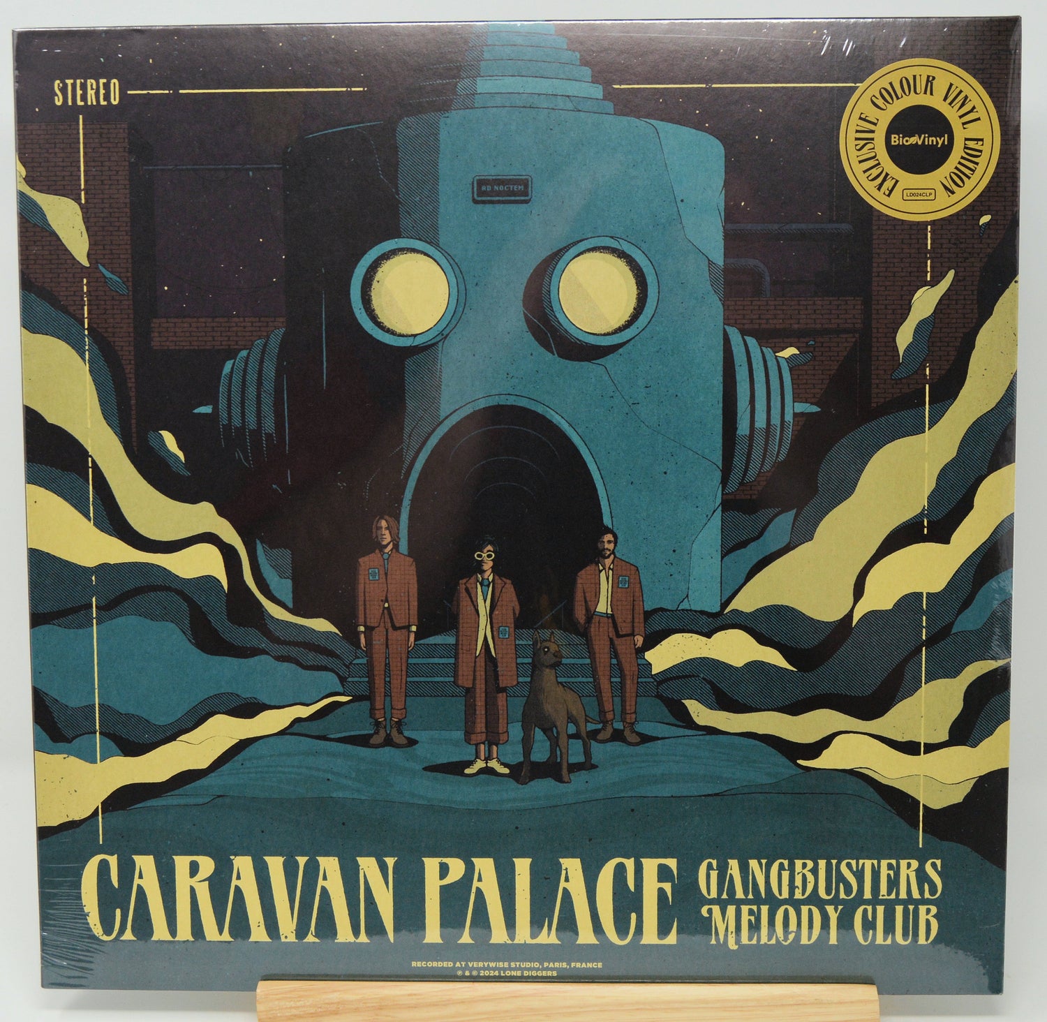 Vinyl record cover for Caravan Palace's 'Gangbusters Melody Club' with a futuristic design and text.