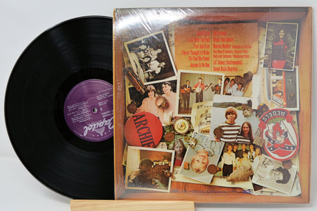 Back cover of Carl Jackson's Old Friends vinyl album with photos, memorabilia, and tracklist