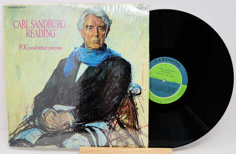Vinyl record with cover featuring Carl Sandburg, labeled 'Caedmon'.
