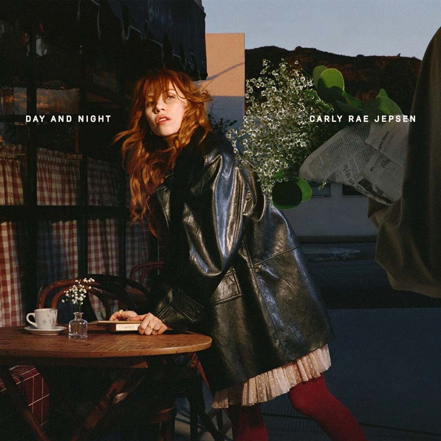 Album cover with a person in a leather coat sitting at a table, surrounded by abstract elements.