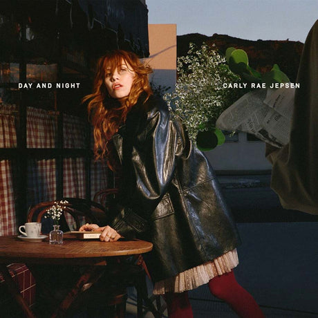 Album cover with a person in a leather coat sitting at a table, surrounded by abstract elements.