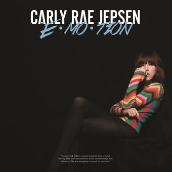 Carly Rae Jepsen E•MO•TION album cover with artist sitting in colorful sweater