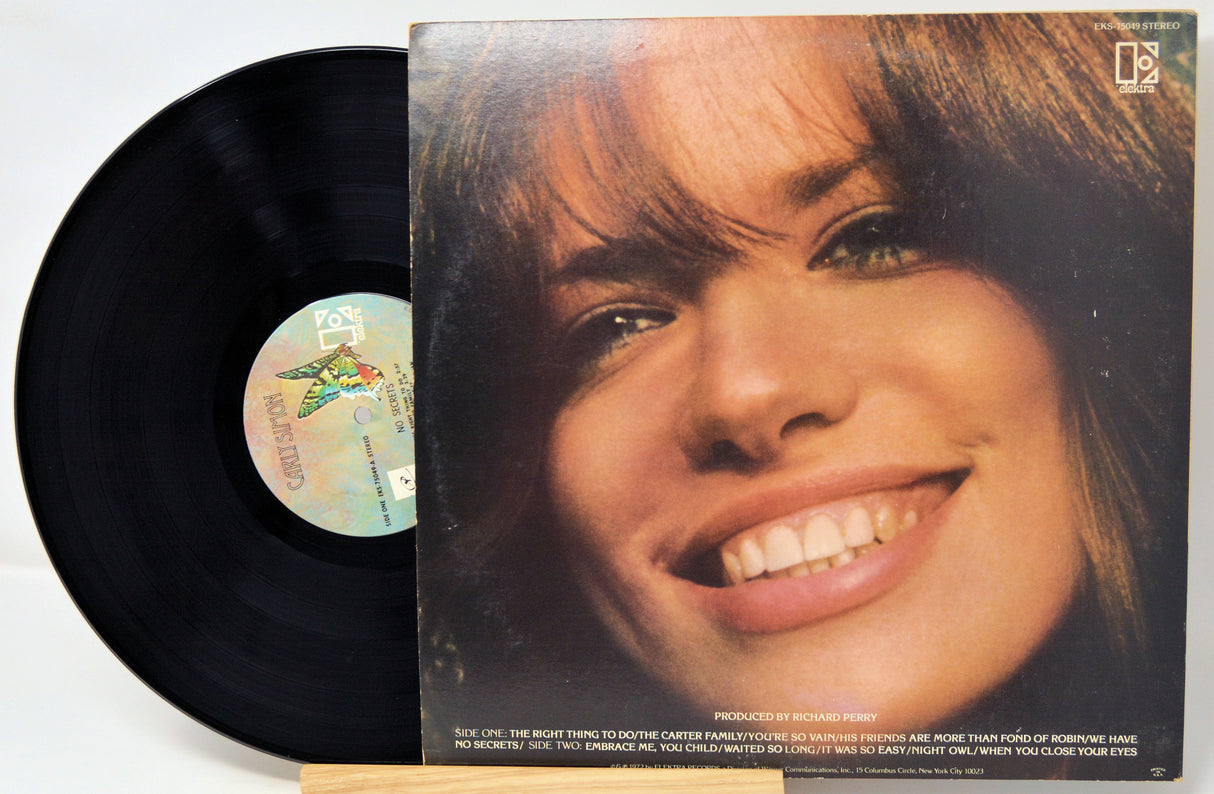 Vinyl record with a cover featuring a close-up of a person's face.