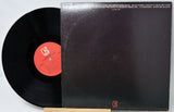 Vinyl record with cover featuring a silhouette of a person at a piano, titled 'Undercurrent' by Bill Evans and Jim Hall.