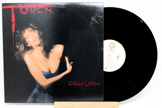Vinyl record with a cover featuring a woman and the title 'Torch' by Carly Simon.