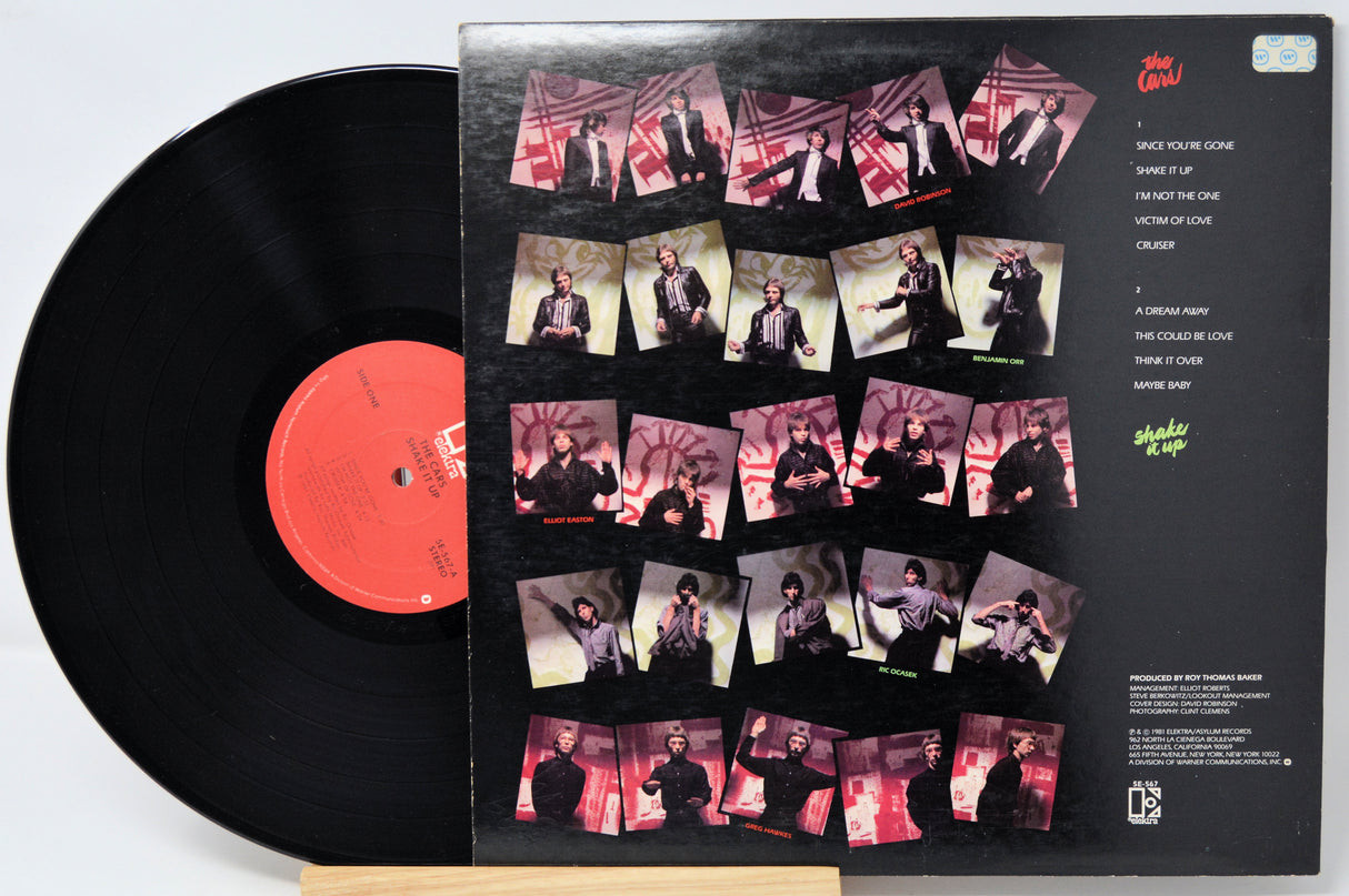 Vinyl record with a colorful cover featuring multiple images of a person.