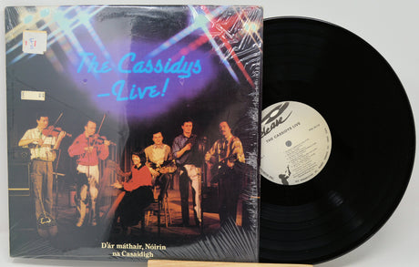 Vinyl record with cover featuring a band and 'The Cassidys Live!' text on a white background