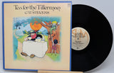 Vinyl record and cover of 'Tea for the Tillerman' by Cat Stevens on a light gray background