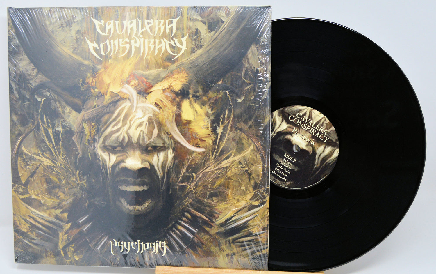 Front cover of Cavalera Conspiracy Psychosis vinyl featuring dramatic artwork
