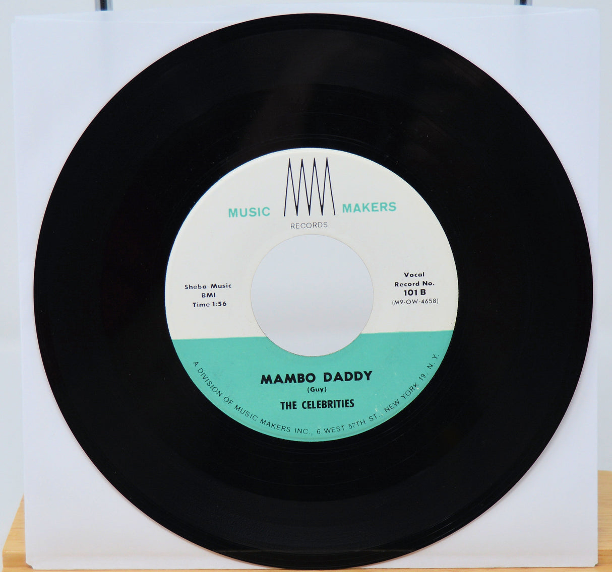 Vinyl record with 'Mambo Daddy' by The Celebrities on a white background