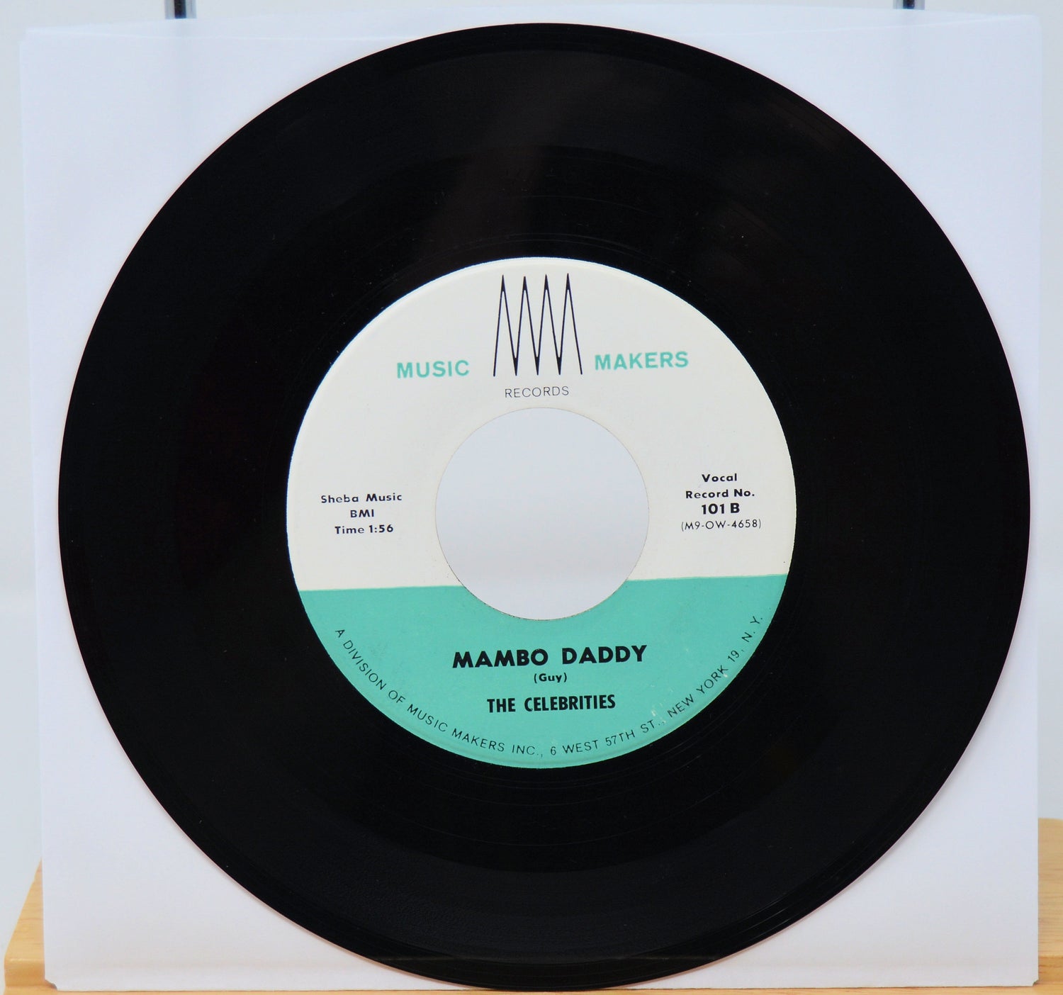 Vinyl record with 'Mambo Daddy' by The Celebrities on a white background
