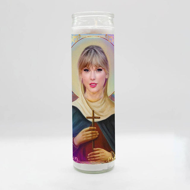 Decorative celebrity-themed prayer candle with iconic portrait and halo design
