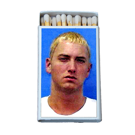 Novelty matchbox featuring a celebrity mugshot on the cover against a blue background