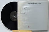 Vinyl record with its cover titled 'The Absence of a Canary' by Mac DeMarco.
