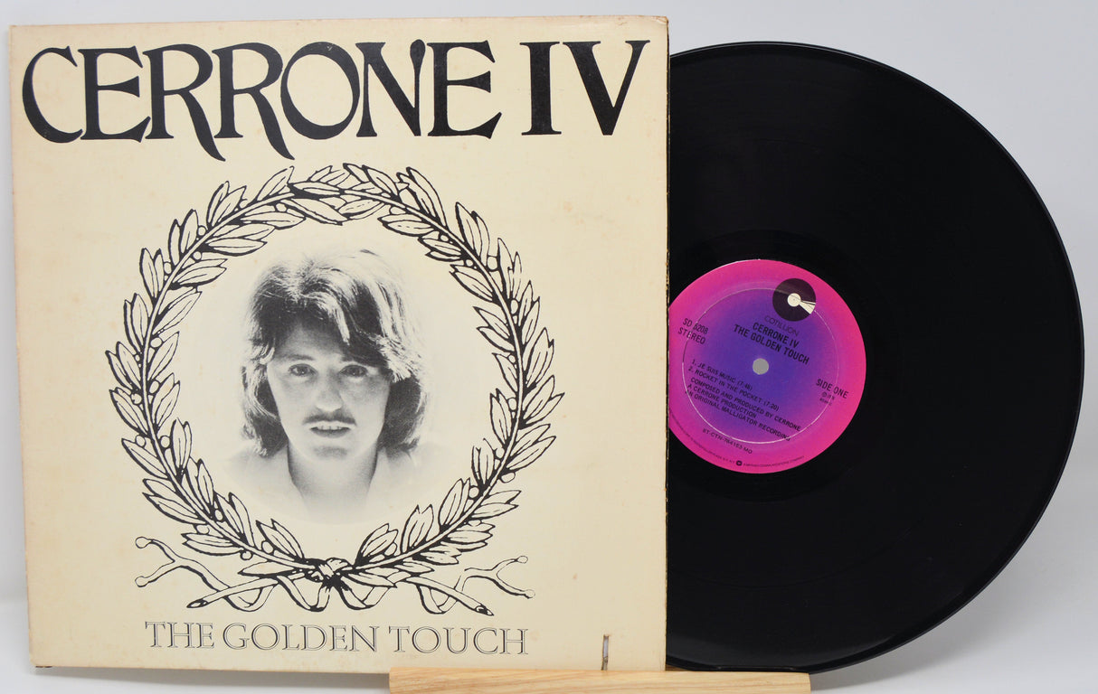 Vinyl record and cover titled 'Cerrone IV The Golden Touch' on a white background
