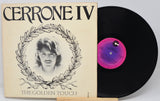 Vinyl record and cover titled 'Cerrone IV The Golden Touch' on a white background